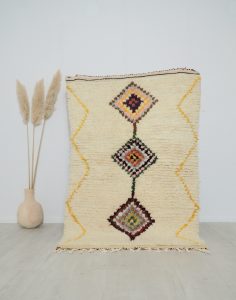 Vrai tapis berbère pure laine fond écru et motifs colorés
