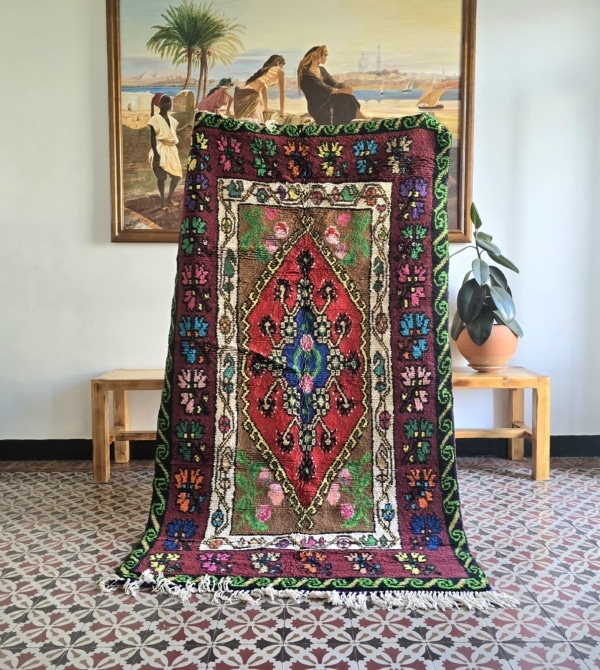 Tapis ancien en pure laine fait main en Algérie, motifs floraux